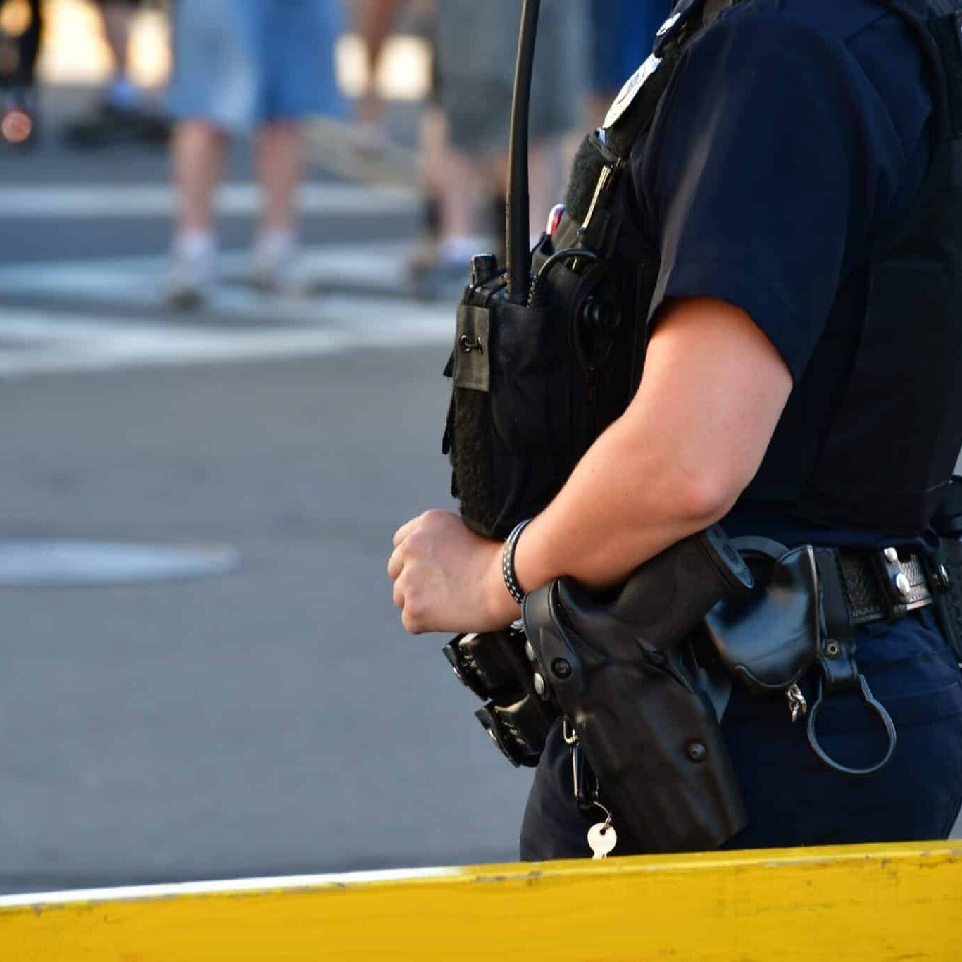 Female Police Officer Standing Guard